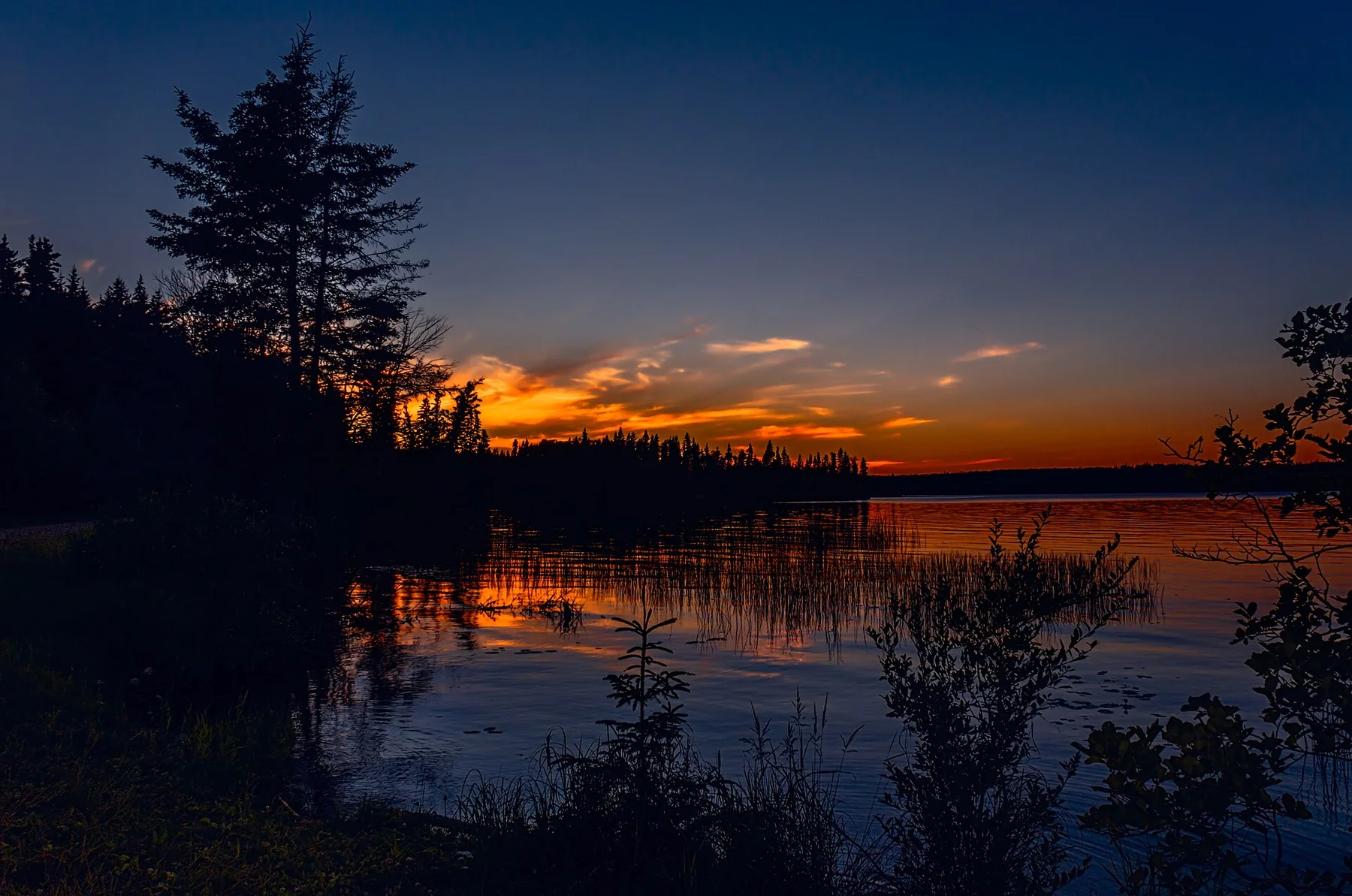 Glow of sunset on the Waskesiu Lake in Prince Albert National Park Saskatchewan, Canada